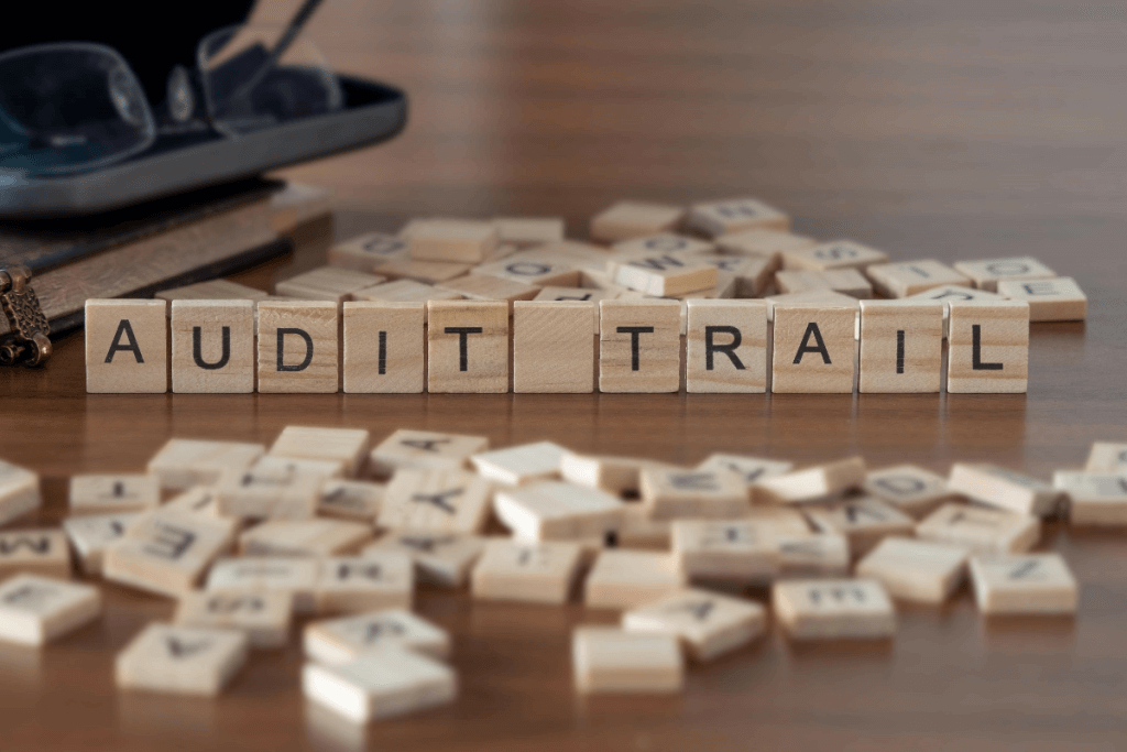 Audit Tail in Wooden Block letters